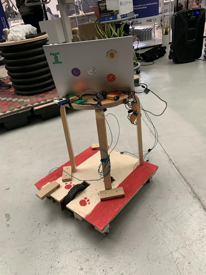 The hamster-controlled chair: a wooden cart with an upright frame