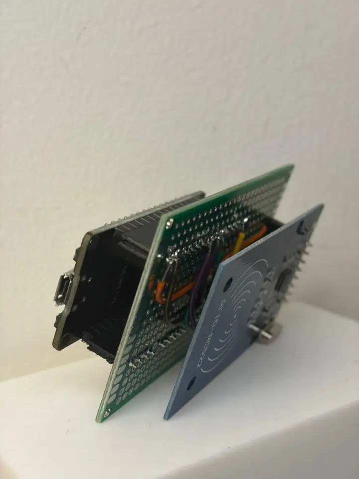 Soldered perfboard stack with ESP32 and RFID reader